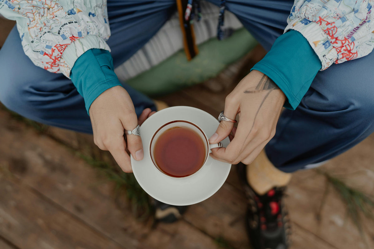 Woman in a quiet moment representing an adaptogen-supported daily routine