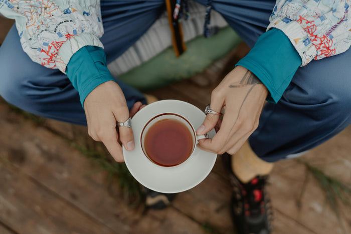 Woman in a quiet moment representing an adaptogen-supported daily routine